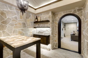 brown wine cellar with hallway to living room