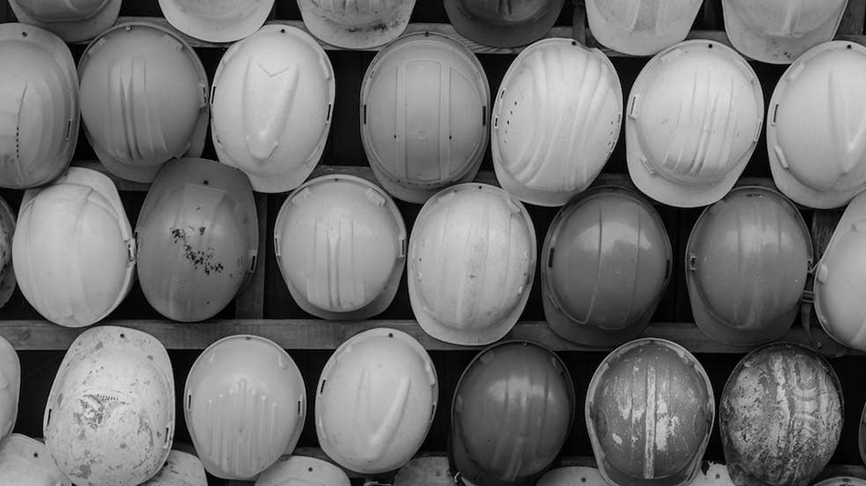 rows of construction helmets