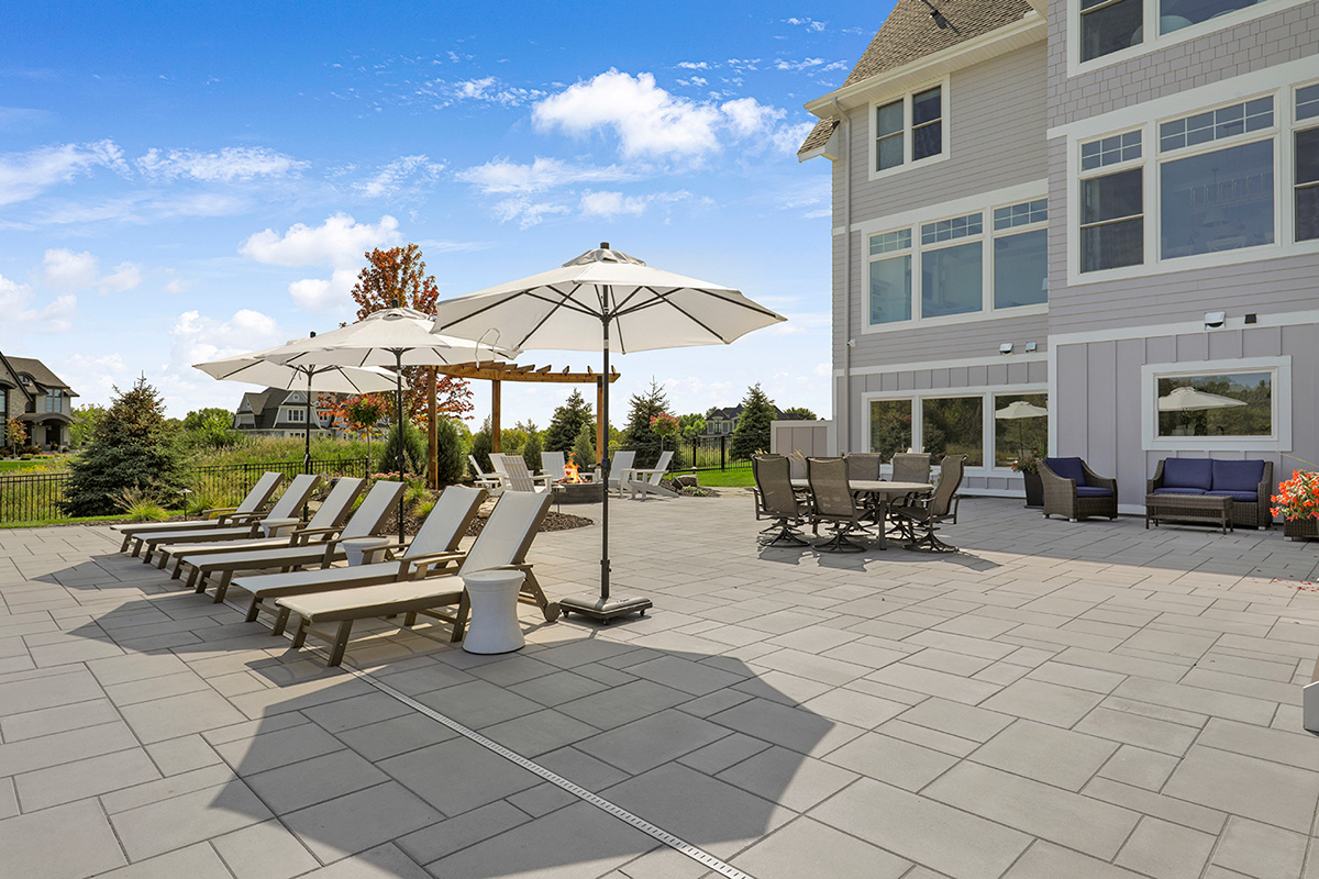 Pavers Over Stamped Concrete For Your Outdoor Patio - Custom One Landscaping